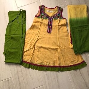 Yellow green salwaar chudidar and pompom dupatta